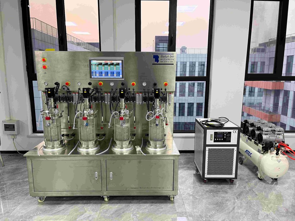 Four-stage parallel glass bioreactor with chiller and air compressor